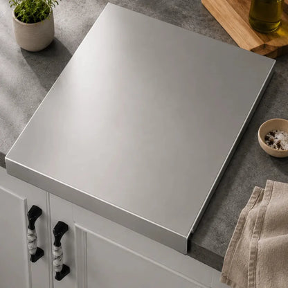 Planche à découper acier inoxydable avec citron et romarin